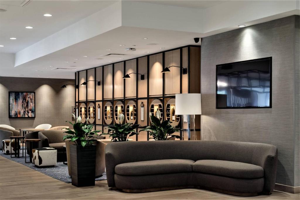 Luxury downtown Kamloops hotel guide artwork with gold city lighting